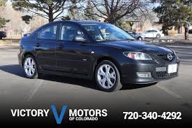 Image result for Sparkling Black 2007 Mazda3