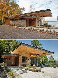 A Contemporary Cottage With A Cantilevered Roof Overlooks A Lake In Canada Contemporary Cottage House In The Woods Modern Cottage