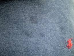 Moisten the spot with water and apply an enzyme presoak (follow directions on label). More Ways To Remove Set In Oil Stains