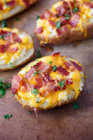These Twice Baked Potatoes Feature Crisp Potato Halves Heaping With A Cheesy Bacon Ranch Potato Filling And T Bacon Ranch Potatoes Recipes Baked Potato Recipes