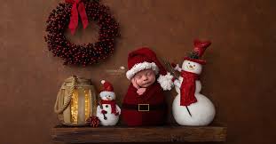 They're still learning about the most wonderful time of the year, so. Christmas Newborn Photos Ohio Baby Photographer