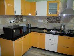 The combination of a light backsplash, paired with dark wood cabinetry and countertops, open up the area. Modern Modular Kitchen At Rs 1200 Sq Ft à¤® à¤¡à¤° à¤¨ à¤• à¤šà¤¨ à¤® à¤¡à¤° à¤¨ à¤°à¤¸ à¤ˆ Mind Space Design Bengaluru Id 4554004655