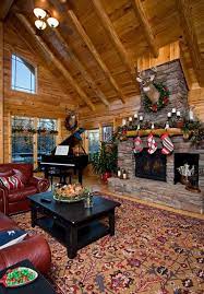 Holiday Safety For Log Home Owners Log Homes Rustic Stone Fireplace Log Home Living
