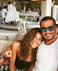 منذ فترة ترددت أنباء، مفادها أن الفنان المصري عمرو_دياب، يعيش قصة حب جديدة بعد انفصاله عن حبيبته السابقة الفنانة المصرية دينا_الشربيني. Ù…Ù‚Ø± Ø¨ Ù…Ù† Ø¹Ù…Ø±Ùˆ Ø¯ÙŠØ§Ø¨ ÙŠÙƒØ´Ù Ù„Ù€ Ø§Ù„Ù†Ù‡Ø§Ø± Ø­Ù‚ÙŠÙ‚Ø© Ø­Ù…Ù„ Ø¯ÙŠÙ†Ø§ Ø§Ù„Ø´Ø±Ø¨ÙŠÙ†ÙŠ Ø§Ù„Ù†Ù‡Ø§Ø±