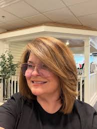 Holiday hair, made easy.✨🎄 This Cezanne Smoothing Treatment, done by  Heather