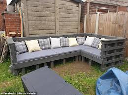 Cushion up all the seats to get the luxurious outdoor sofa. Diy Mother Creates Outdoor Sofa With Old Pallets Of Wood And Only Pays For The Paint And Cushions Daily Mail Online