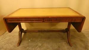 Pair of vintage nest coffee tables with red leather top. A 8336 Coffee Table Leather Top English Eurotroc Belgium Export Recent Added Items European Antiques Decorative