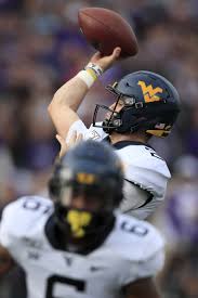 qb jarret doege gives wvu hopes for bowl berth