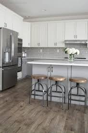 My Friends Gorgeous Gray And White Kitchen Cuckoo4design Gray And White Kitchen White Kitchen Design Grey Wood Floors Kitchen