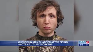 Man charged after firing shots at utility workers