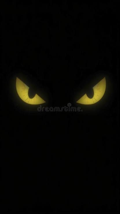 Glowing Yellow Eyes Staring from the Darkness Create a Spooky Ambiance  Stock Photo - Image of vision, fantasy: 358266228