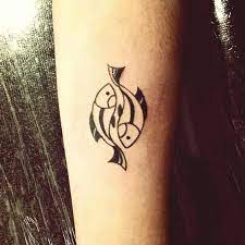 40 Best Pisces Tattoos Designs And Ideas With Meanings Pisces Tattoos Pisces Tattoo Designs Inner Arm Tattoos