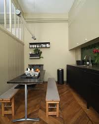 Inside Aesop S Stylish European Headquarters In Paris The Robust And Functional Vipp Kitchen Served As A Starting Point To Cool Kitchens Black Table Interior