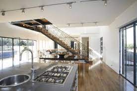 Stairs Take Center Stage Stairs In Kitchen Remodel Bedroom Stairs In Living Room