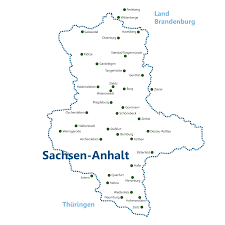 Das untere feld zeigt in silber einen schreitenden schwarzen bären auf einer schwarzgefugten roten zinnenmauer mit offenem tor. Einheitsgemeinde Stadt Genthin Landesverband Sachsen Anhalt Der Interessenvereinigung Jugendweihe E V