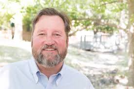 Radio spot suggests Dunn might benefit from power line, offers little proof 