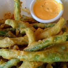 Lightly dredge each green bean in the flour, then dip it in the beaten eggs, and then evenly coat it in the panko mixture. Pin By Lydia Martinez On Wants Crispy Green Bean Recipes Crispy Green Beans Party Food Appetizers