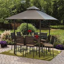 27.7l x 22.83w x 35.83hchair fabric material: 15 Outdoor Patio Umbrellas Shade Hgtv Com Hgtv Outdoor Patio Patio Set Garden Patio Furniture