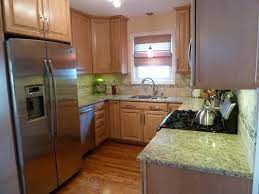 Giallo ornamental granite with maple cabinets. Giallo Ornamental Granite Countertops With Natural Maple Cabinets Kitchen Remodel Kitchen Inspirations Kitchen Remodel Idea