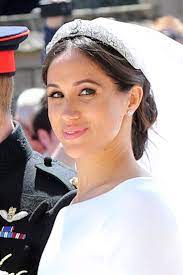 Meghan Markle Dazzles In A Sleek Chignon And Tiara For Her Wedding Day Meghan Markle Wedding Harry And Meghan Wedding Royal Wedding