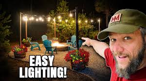 First things first, your fire pit should be at least 10 feet away from any structure or combustible surface. Hanging String Lights Around My Fire Pit I Used Whiskey Barrel Planters Youtube