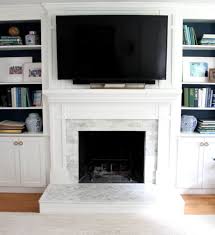 And that is, installing a contemporary linear fireplace in a home with traditional or transitional architecture because it looks 'new and trendy'. How To Tile Over A Brick Hearth Shine Your Light