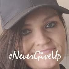 What is the name of a charity or non-profit in Waterloo Region that  collects business clothes and gives them to people who are at risk of or  escaping homelessness and need clothes