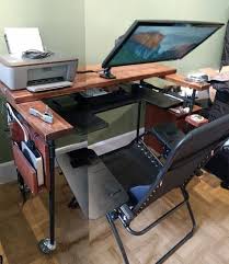 in my continuous search for the ultimate computer workstation i decided to give a reclining desk a try while i love my diy computer desk desk ergonomic desk