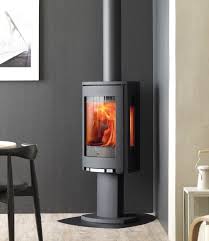 Drolet escape 2100 wood stove on pedestal 2,700 sq. 6 Modern Takes On Wood Burning Stoves Architectural Digest