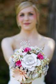 Check out this tutorial to learn the technique behind easy rolled paper flowers with the cricut, and the quilting tool cricut paper rose bouquet tutorial. Amazing Flower Bouquets Crafted Lovingly Out Of Paper What A Great Job Cricut Wedding Wedding Paper Flowers