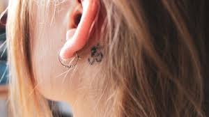Simple and elegant is what best describes the floral design behind the ear tattoo below. Behind The Ear Tattoos Pain How Much It Hurts Aftercare Tips