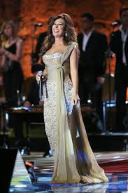 Ounousa نجوى كرم تتألق باجمل الفساتين الذهبية في حفلاتها Formal Dresses Fashion Prom Dresses