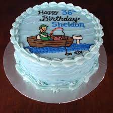 Fondant fisherman, boat, and other decorations. Fisherman Fishing Boat Buttercream Cake Boat Cake Fish Cake Birthday Cupcake Cakes