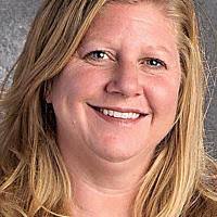 Hawkins science teacher saluted by county