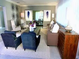 Living room chairs can serve as focal points for the room. Contemporary Living Room With Navy Accent Chairs Hgtv