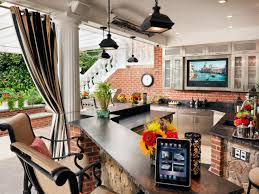 Look for marble countertops in a neutral color scheme and add contrast with bar stools, benches and other seating options. Luxury Outdoor Kitchens Pictures Tips Expert Ideas Hgtv