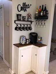 This coffee bar uses a small buffet as its base, which contains functional drawers for storage. Coffee And Wine Station Bars For Home Coffee Bar Home Small Apartment Decorating