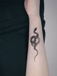 Make a snake tattoo and you will always be conspicuous and enigmatic! Snake Tattoos Pictures Images Designs Ideas Picsmine