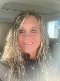 Should I do some low lights ? And or highlights? I have wavy long hair and  it's naturally this way. 57 is my age , any ideas for a change is  appreciated.