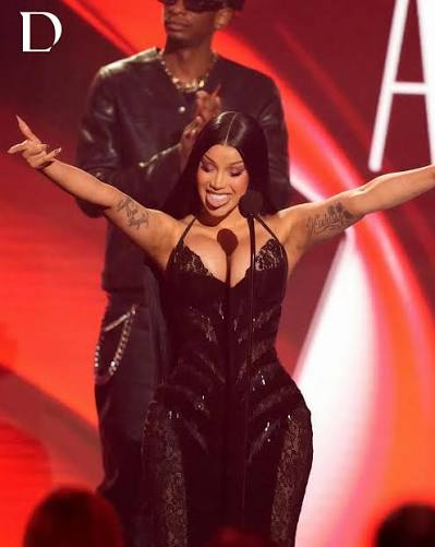 RAPPER CARDI B IN DO LONG AS SHE WINS BEST FEMALE HIP HOP ARTIST AT THE BET  AWARDS 2026 Cardi B @iamcardib appears in DO LONG on stage at the BET Awards