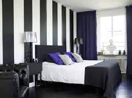 The combination of black and white is applicable in nearly every part of the house, regardless if it is in the interior or exterior. Modern Interior Decorating Black Plus Another Color Combination White Wall Bedroom Striped Walls Black And White Striped Wall