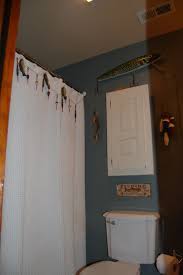 (24) wood towel bars peg racks toilet tissue holders etc. Another View Of The Boy S Fishing Bathroom With The Fishing Garland On The Shower Curtain Fish Bathroom Fishing Bathroom Decor Bathroom Decor