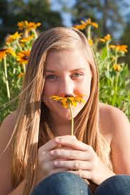Girl with an aster stock photo. Image of enjoying, pretty