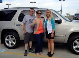 Dave Stephanie Eng Of Volga Are Giving The Thumbs Up On Their New Chevy Tahoe They Love The Versatility Of This New Chevy Tahoe Car Dealership Full Size Suv
