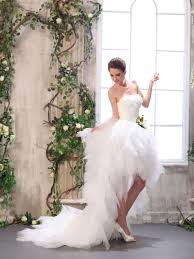 With a deep v neck. 25 Of The Most Ridiculously Beautiful Hi Lo Wedding Dresses On Pinterest