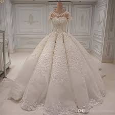 Find great deals on ebay for satin lace ball gown wedding gown. Designer Wedding Dresses Elegant Long Gorgeous Dubai Arabia Ball Gown Lace Appliques Crystal Beads Short Sleeves Bridal Gowns Wedding Dress Latest Designs Of Wedding Gowns Latest Fashion For Wedding Dresses From Officesupply
