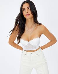 Work one of this season's key trends into your everyday look with our offering of the ultimate corset tops. Lace Corset Top In White Glassons