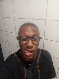 Can someone edit Dr. Manhattan to look like an emo kid from the early  2000's?