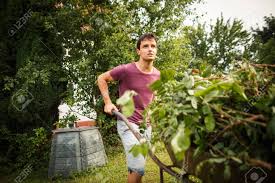Guests should stay out of the water.. Handsome Young Man Gardening In His Garden Stock Photo Picture And Royalty Free Image Image 108973382