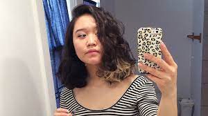My hair sticks out like a porcupine, and even with wax it doesn't stay flat (unless i'm doing it wrong?). How I Learned To Love And Style My Frizzy Wavy Asian Hair Self